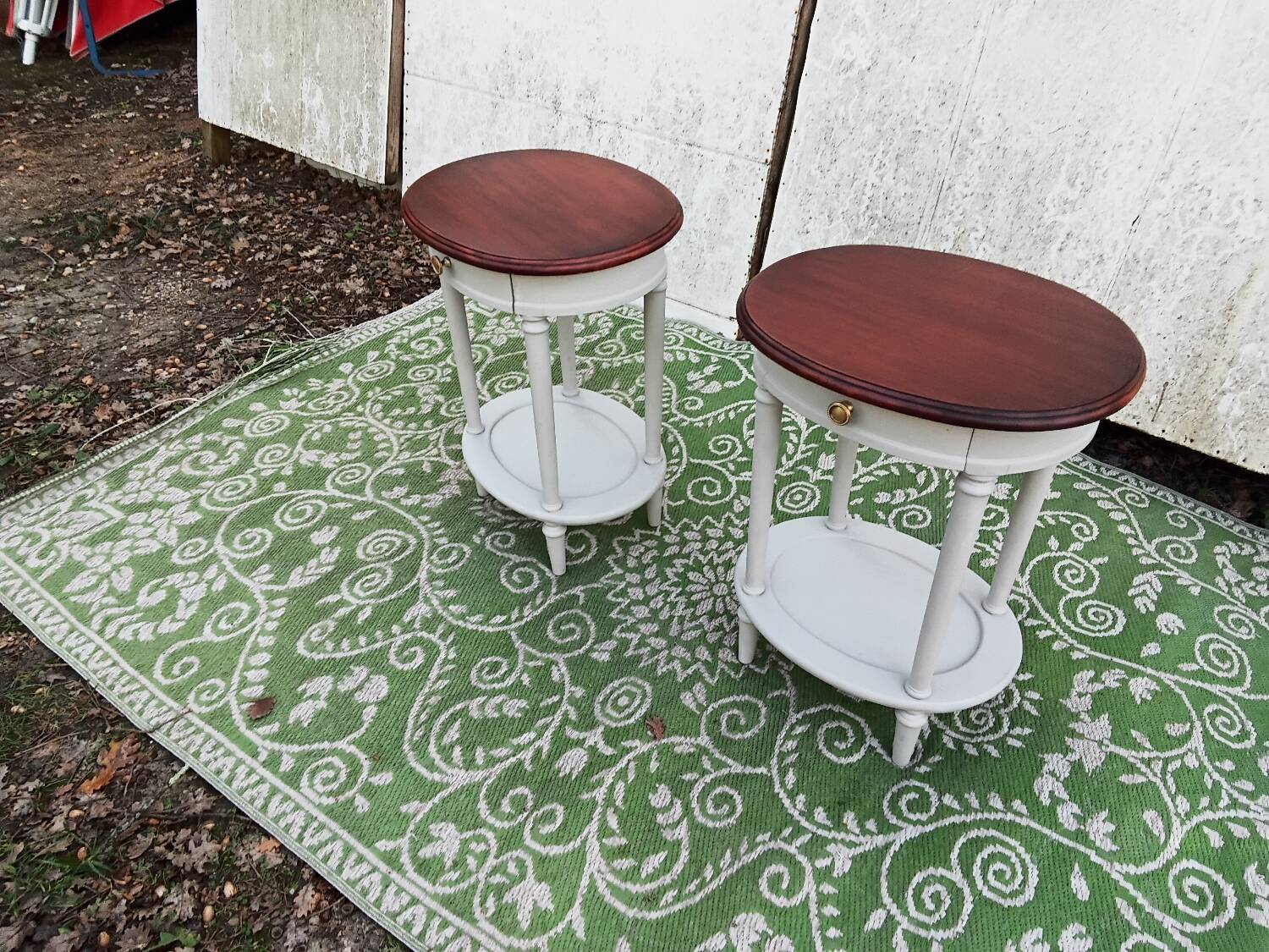 Pair of oval bedside tables