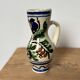 Small Korond style ceramic pitcher with floral motifs