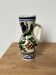 Small Korond style ceramic pitcher with floral motifs