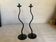Pair of black hysteria-style candlesticks
