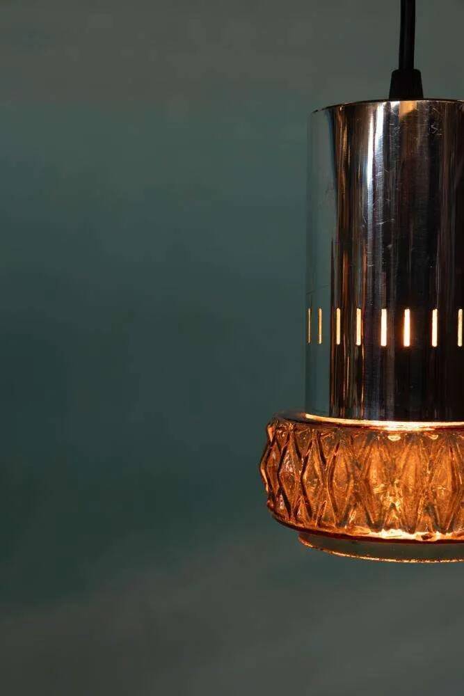 Suspended glass from the space age, mid-century glass from the 1960s.