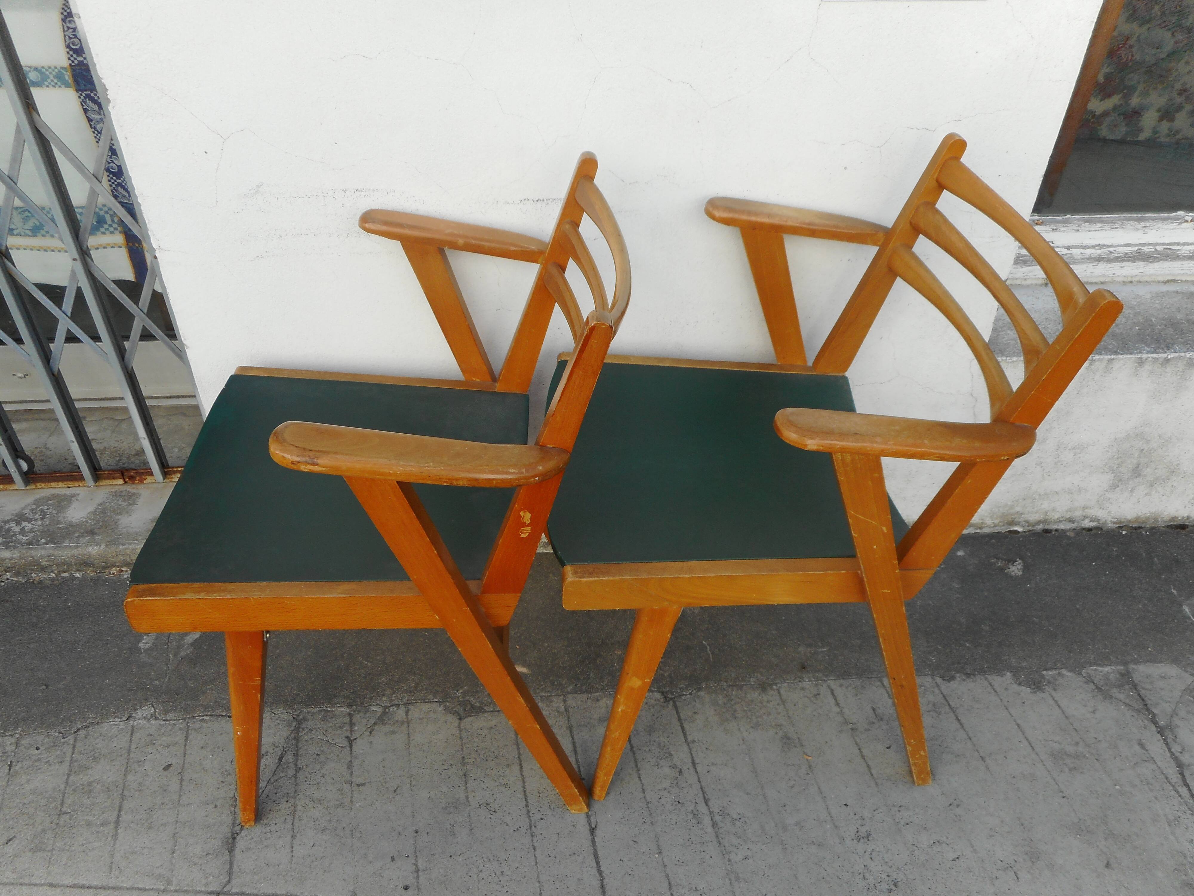 Pair of light wood armchairs