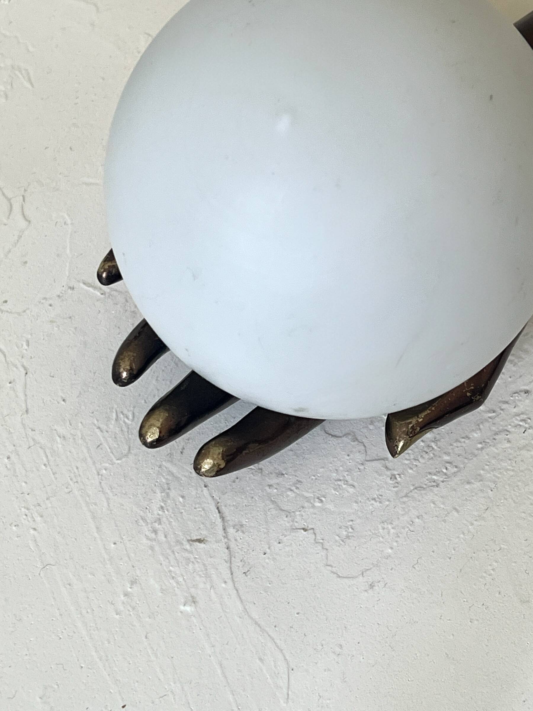 Vintage table lamp hand-crafted in bronze with an opaline globe, Maison Arlus 1970.
