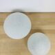 Pair of speckled glass ball wall lights from Vianne, half sphere