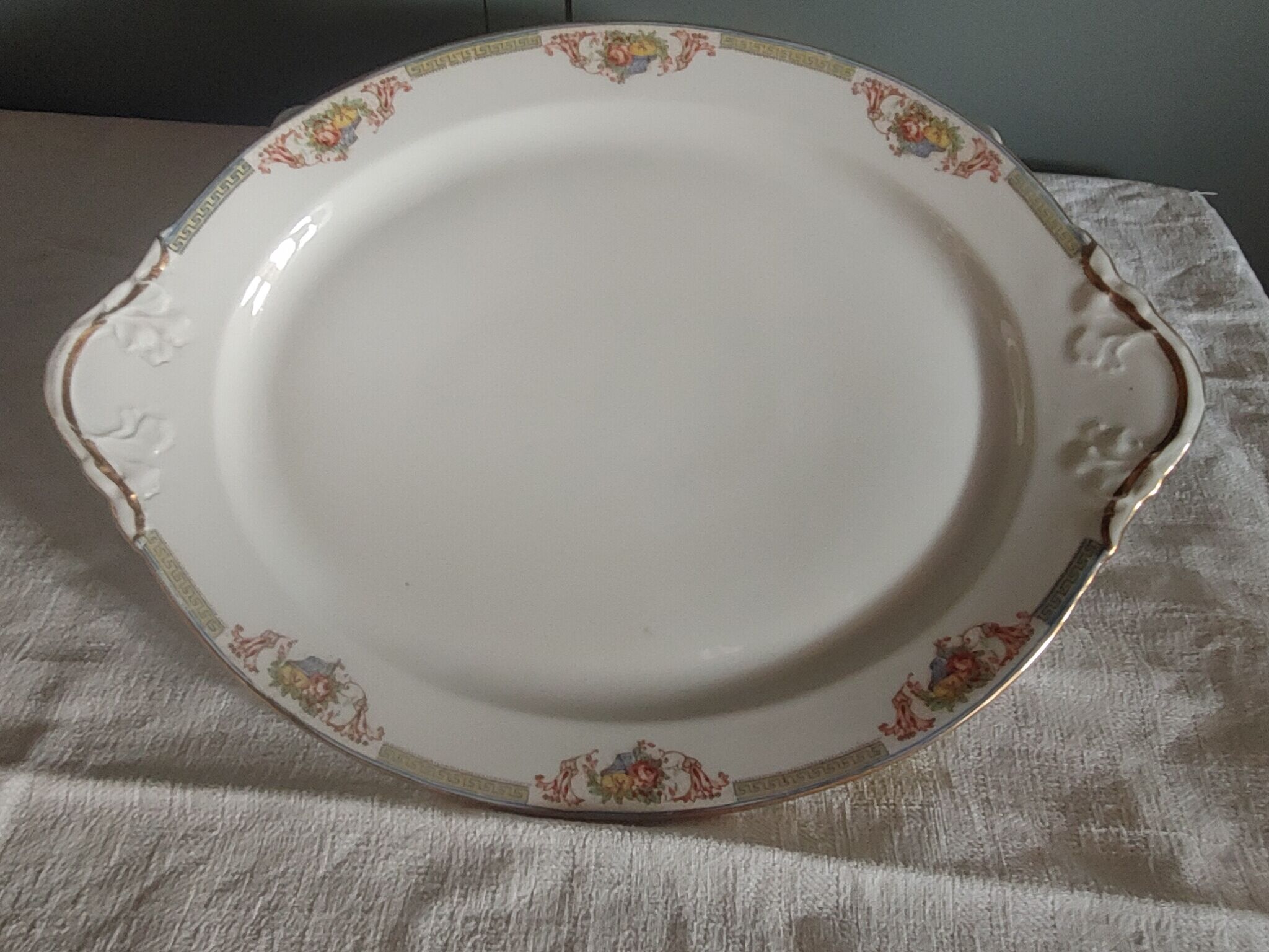 Large serving dish in Limoges porcelain Flower baskets, fruit - early 20th