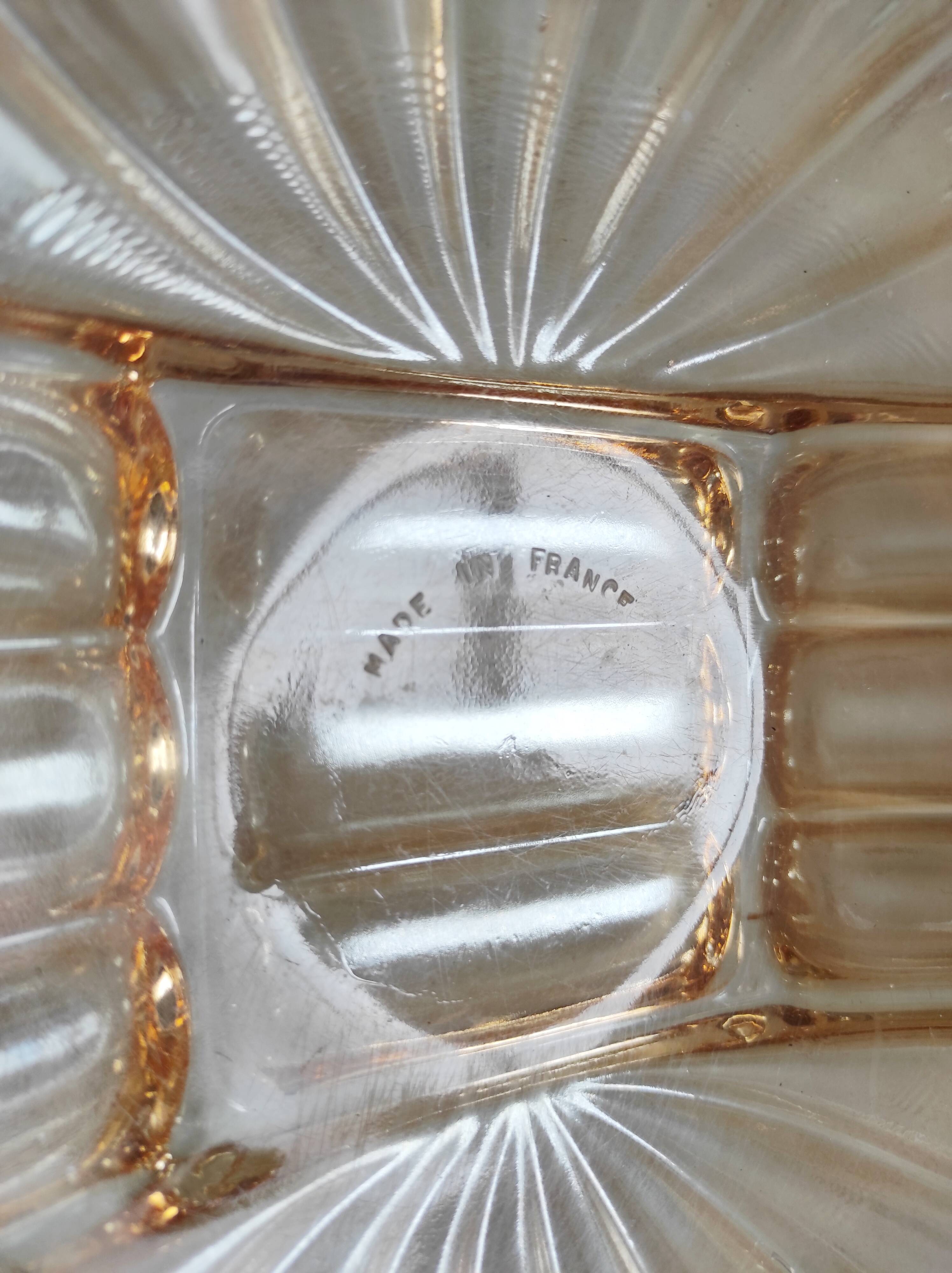 Iridescent orange glass cup