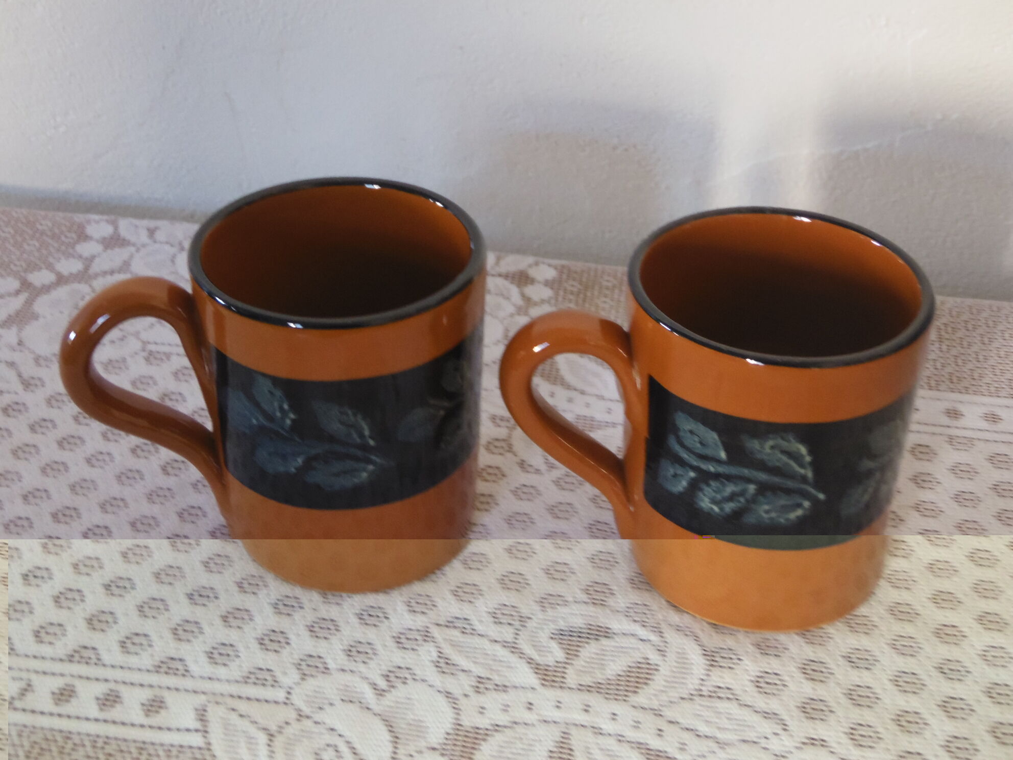 2 glazed terracotta mugs
