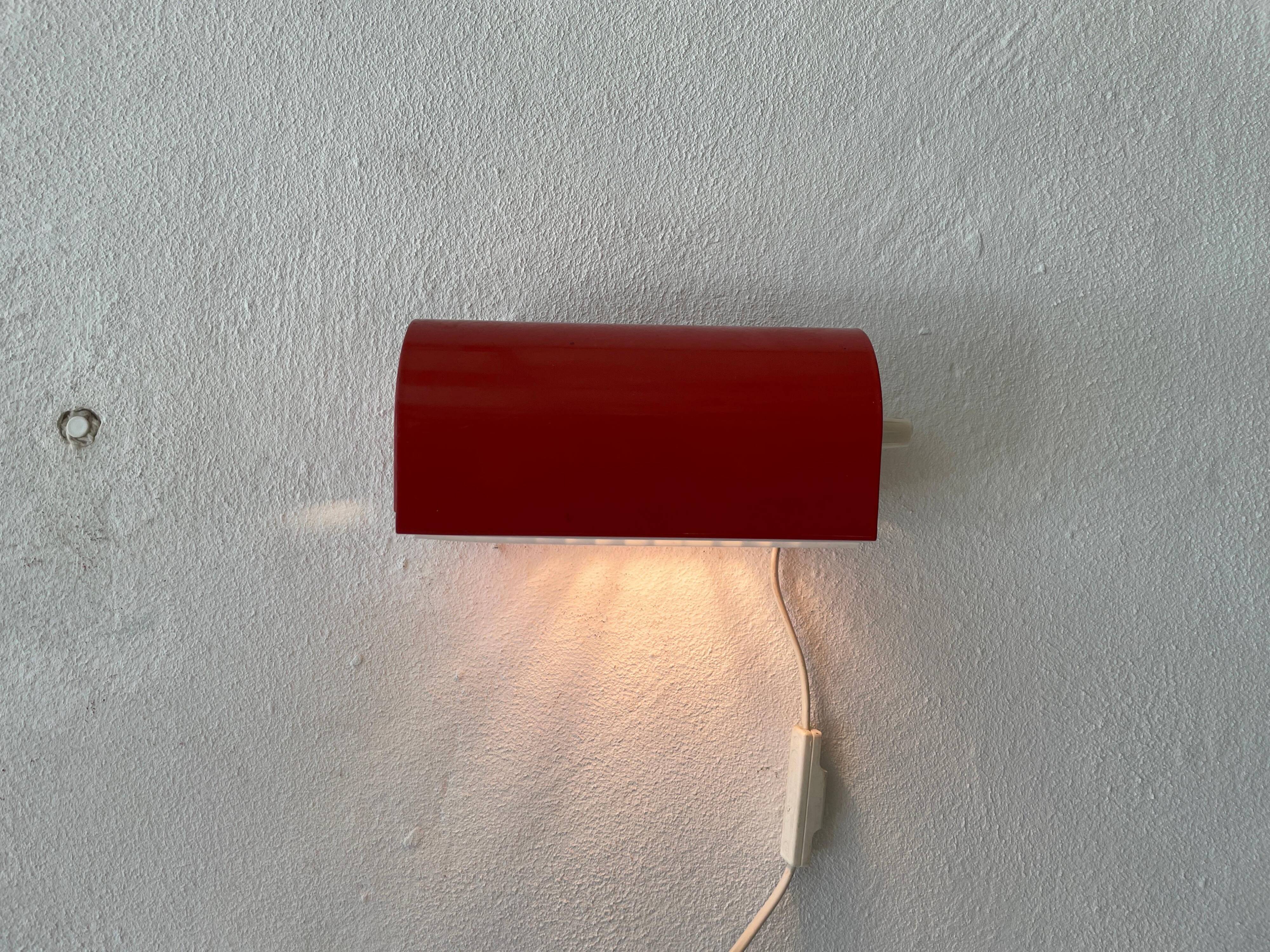Simple red metal wall light from the AGE, 1970s, Germany.