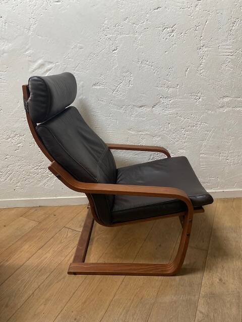Leather armchair with footrest