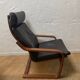 Leather armchair with footrest