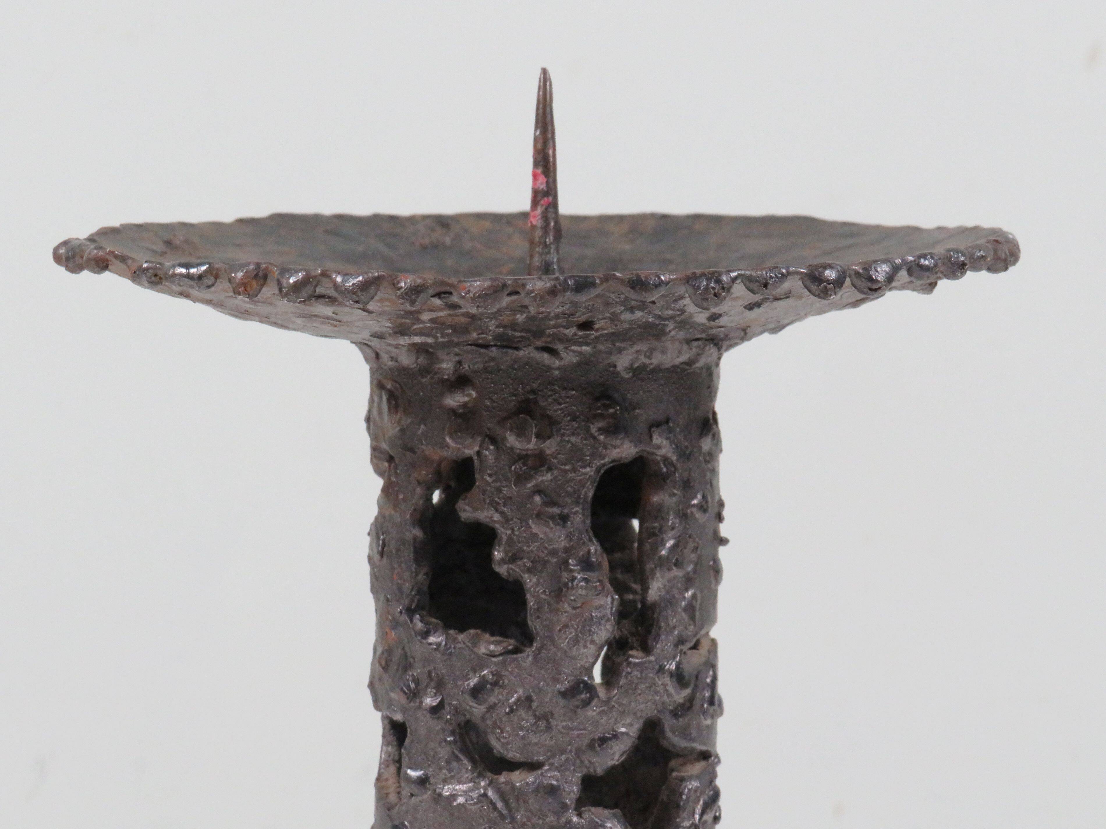 Brutalist wrought iron candlestick, European craftsmanship, 1960s