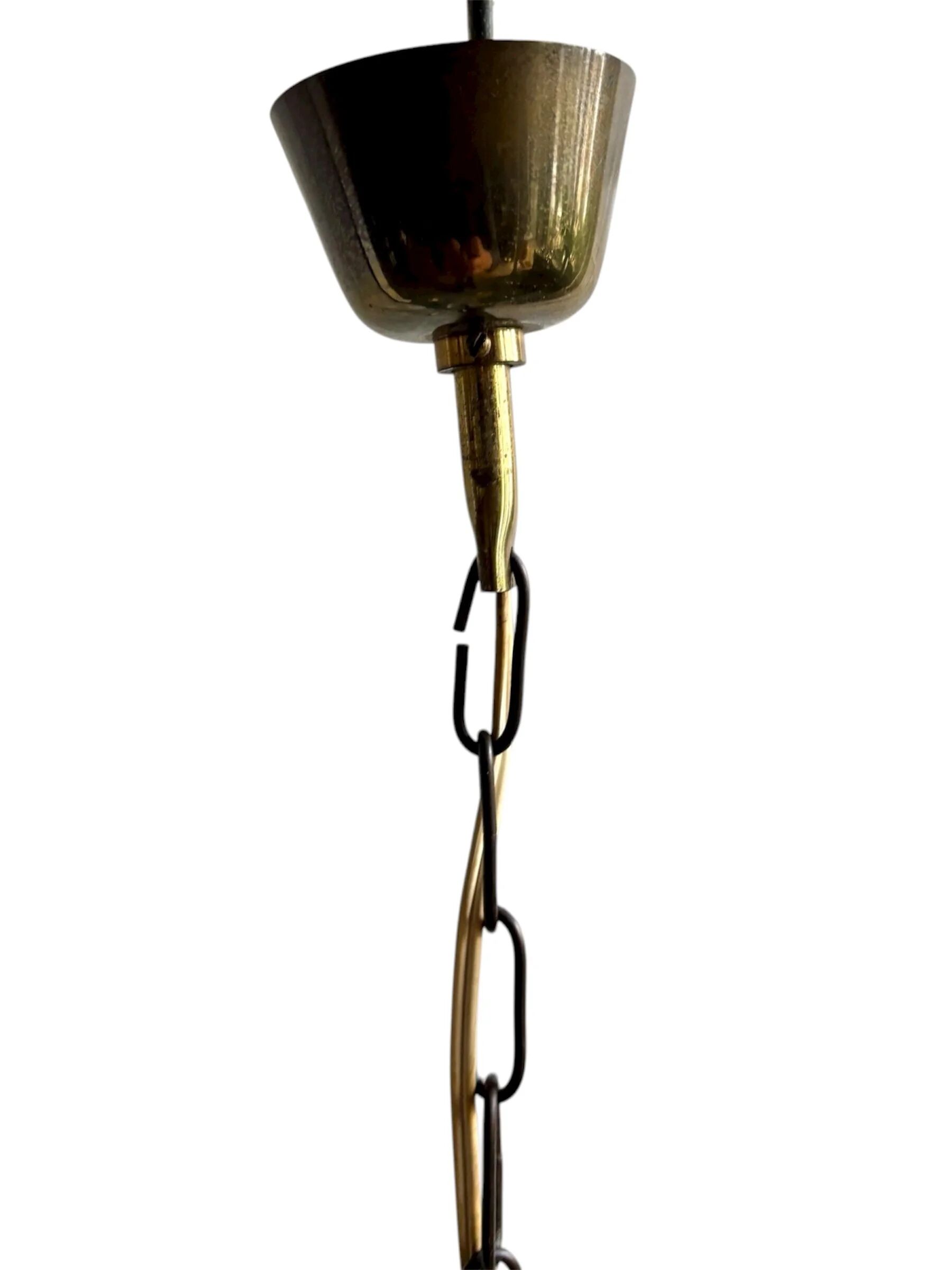 4-light chandelier in glass and gold metal