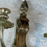 Pair of Louis XVI style bronze wall sconces