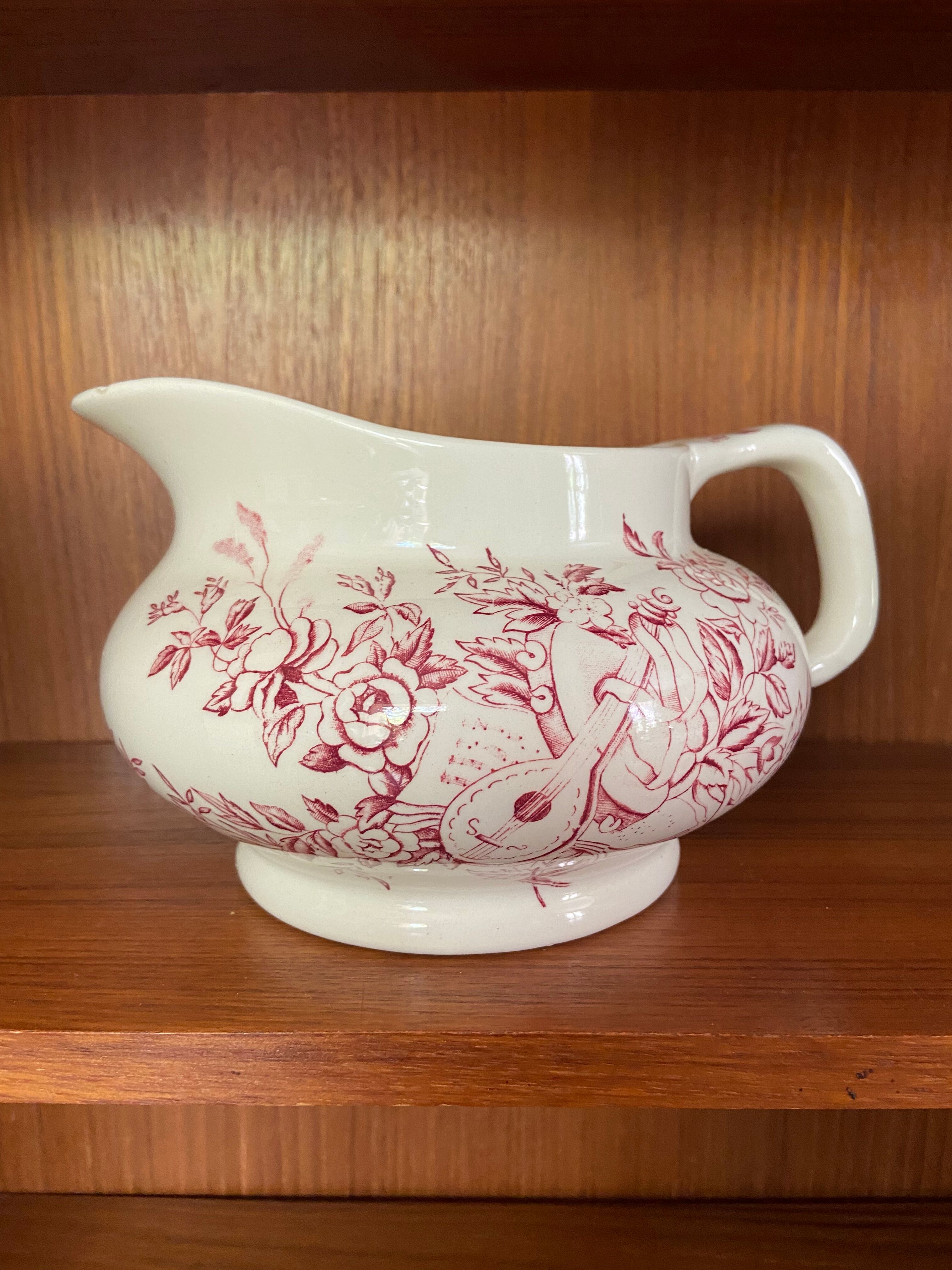 Vintage earthenware pitcher Iron earth