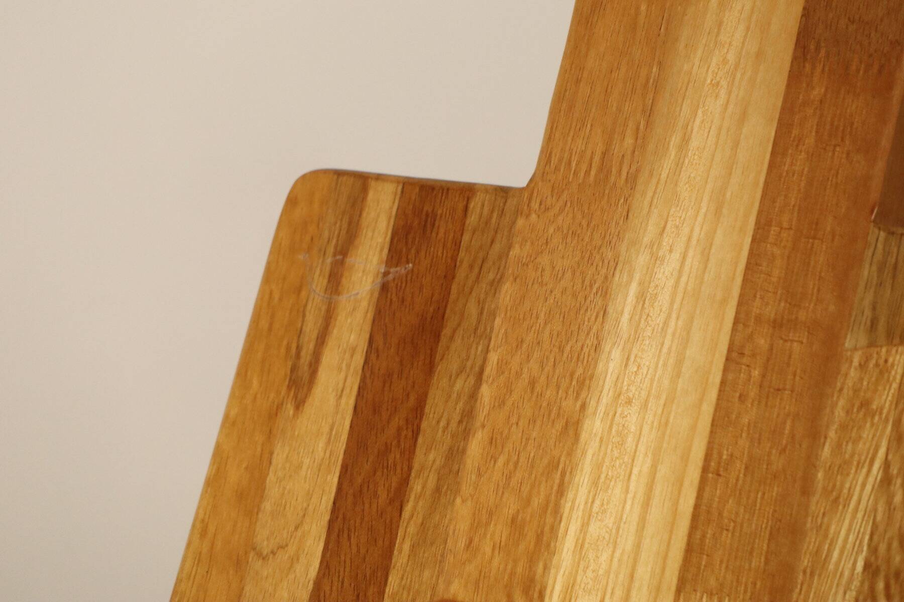 Sculptural brutalist armchair in solid elm, 1980.