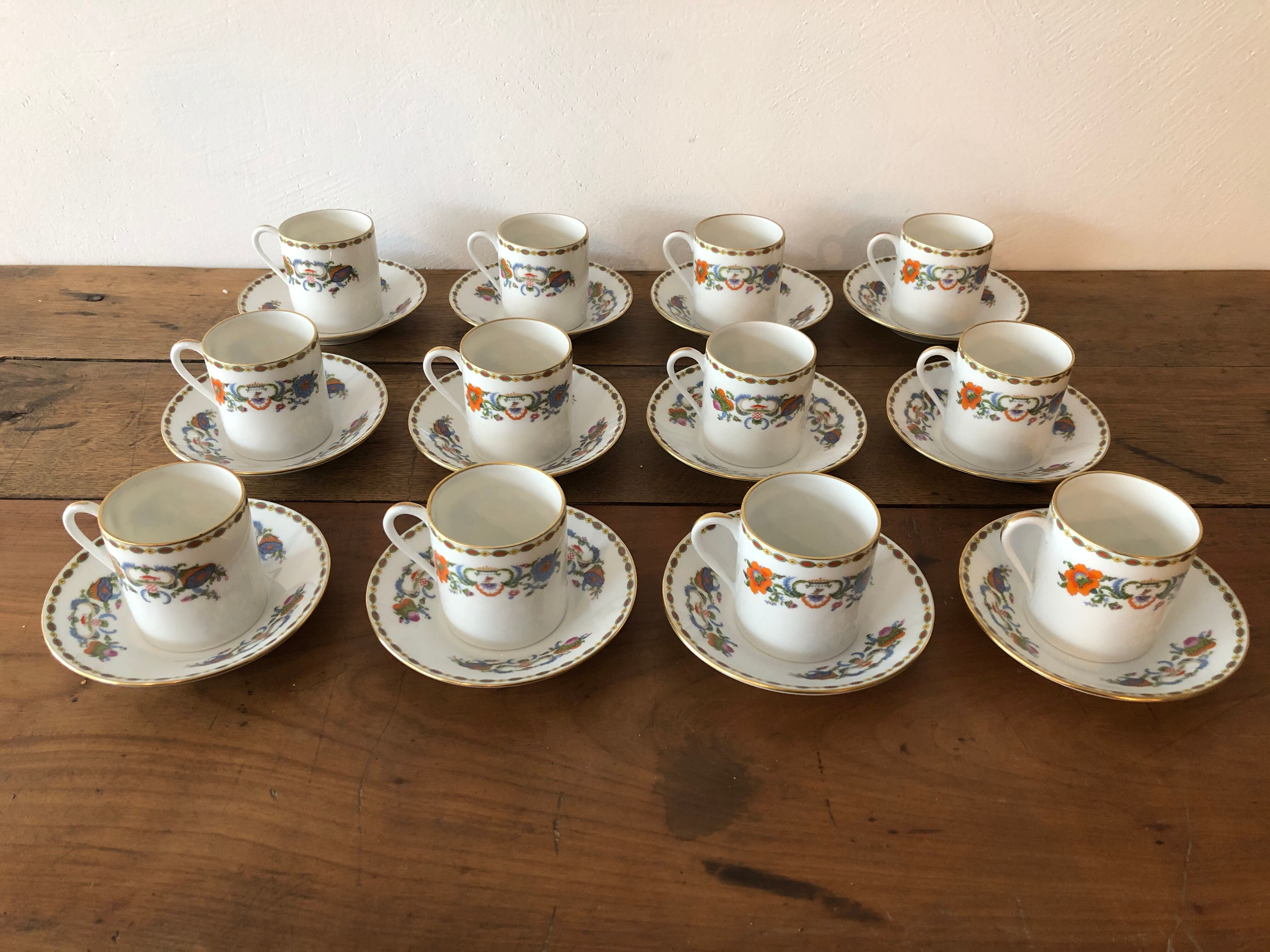 Service of 12 porcelain coffee cups, Raynaud, Limoges, 1950s.