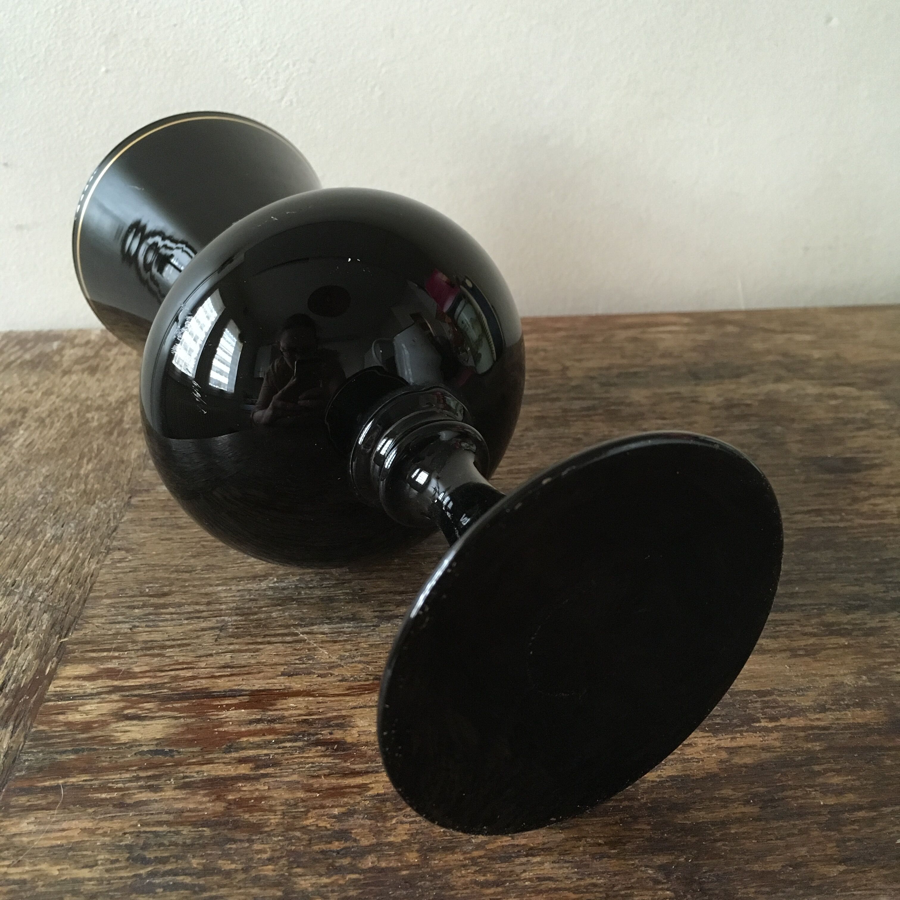 Large black vase with faience gold edging