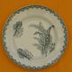 Set of 4 flat plates in saint amand earthenware. lily of the valley decor.