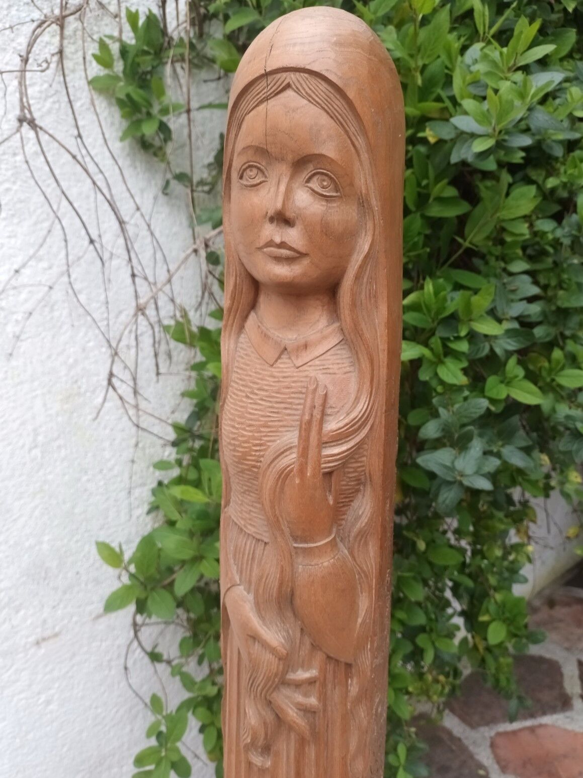 Young woman sculpture by Ray Boterf