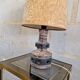 Ceramic lamp with openwork design and double lighting