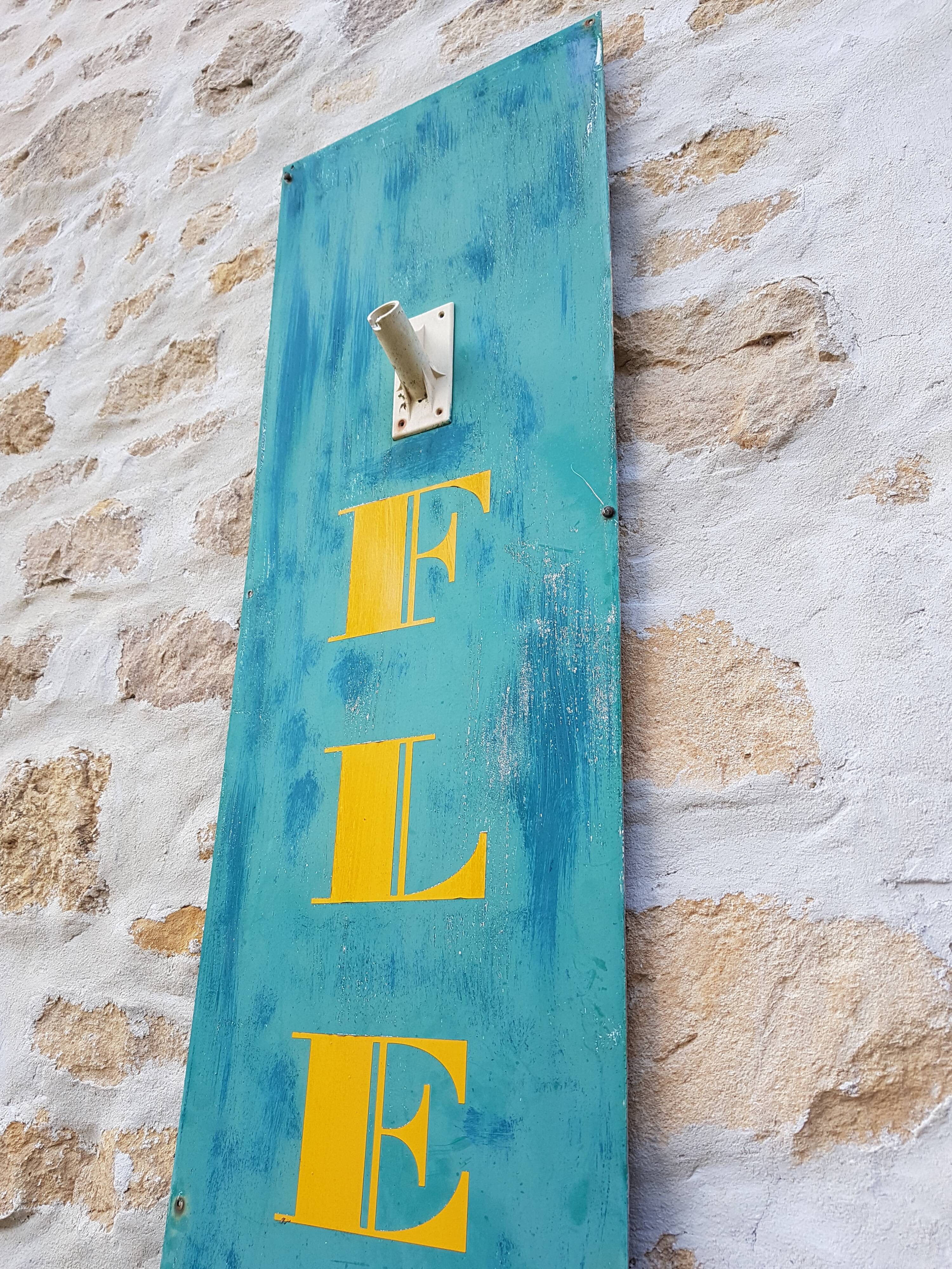 Former painted plate sign of florist