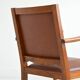 Antique brutalist oak and vinyl armchair