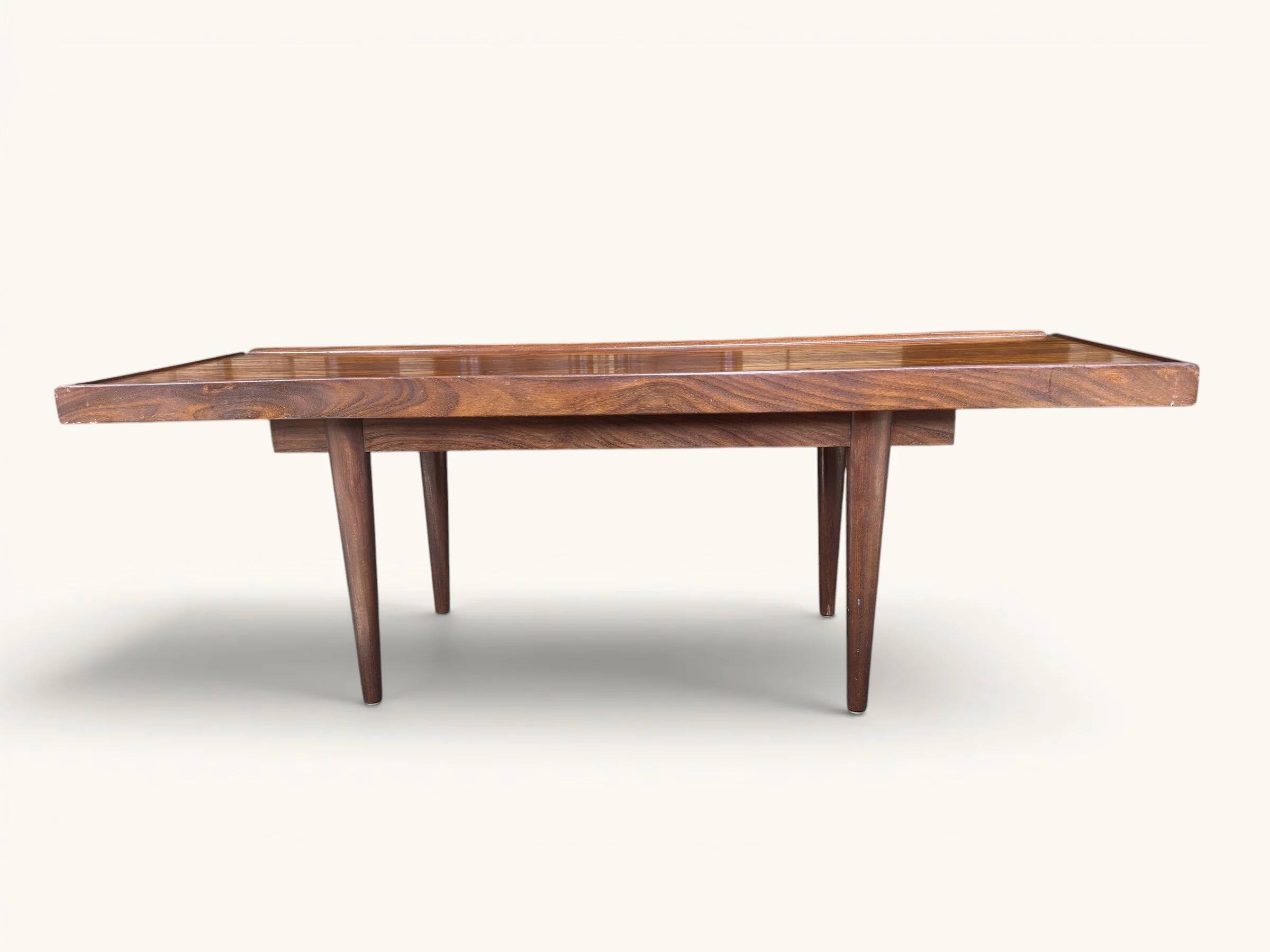 Vintage teak coffee table with a reversible top.