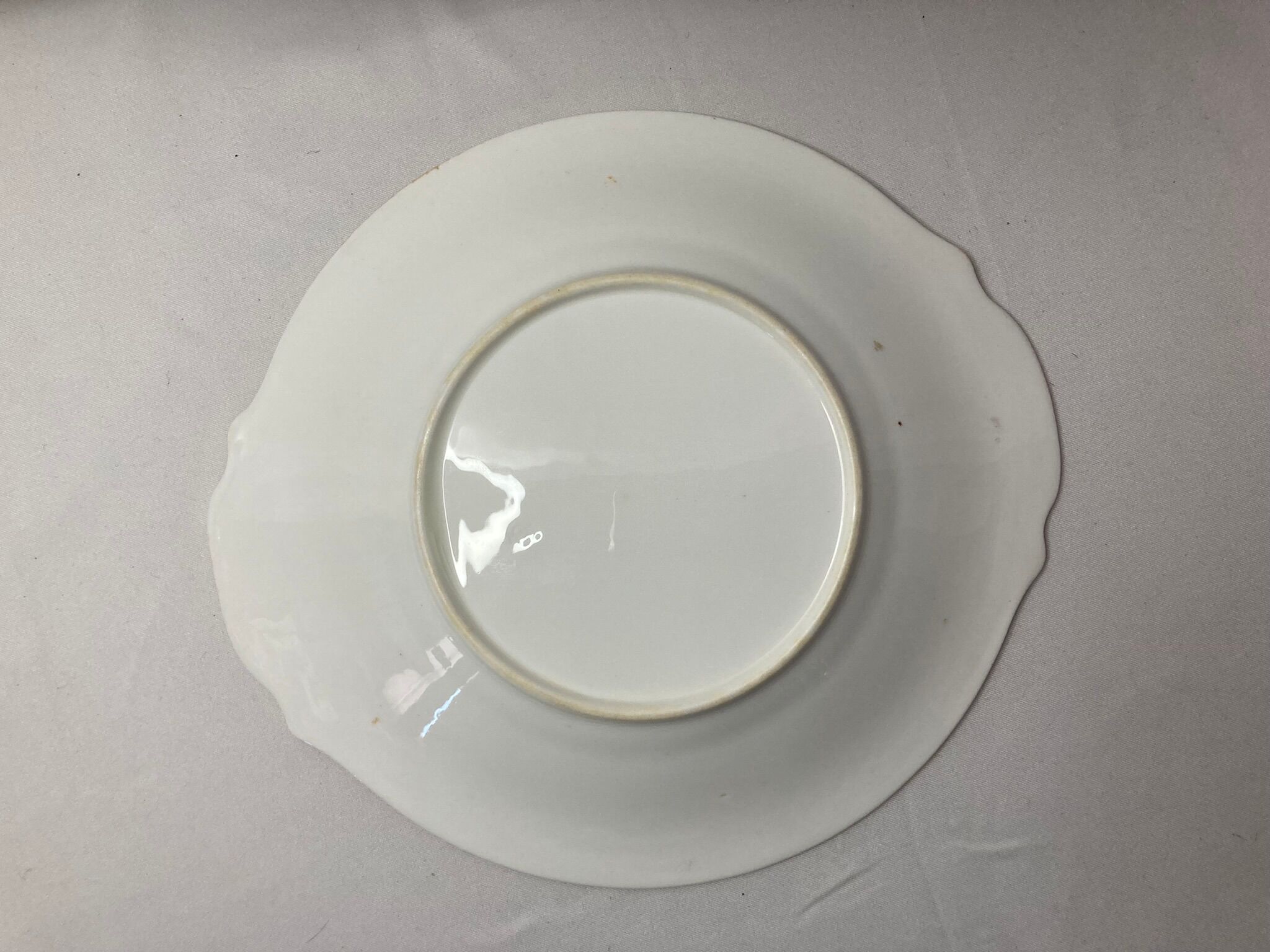 Old earthenware serving dish decorated flowers and gold around 1900