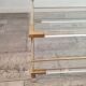 Acrylic glass and brass coffee table, 1985