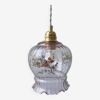 Pink glass pendant light and vintage flower decor