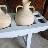 Antique painted wooden jar holder with 4 earthenware jars