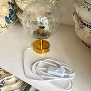 Cracked glass and gold metal table lamp