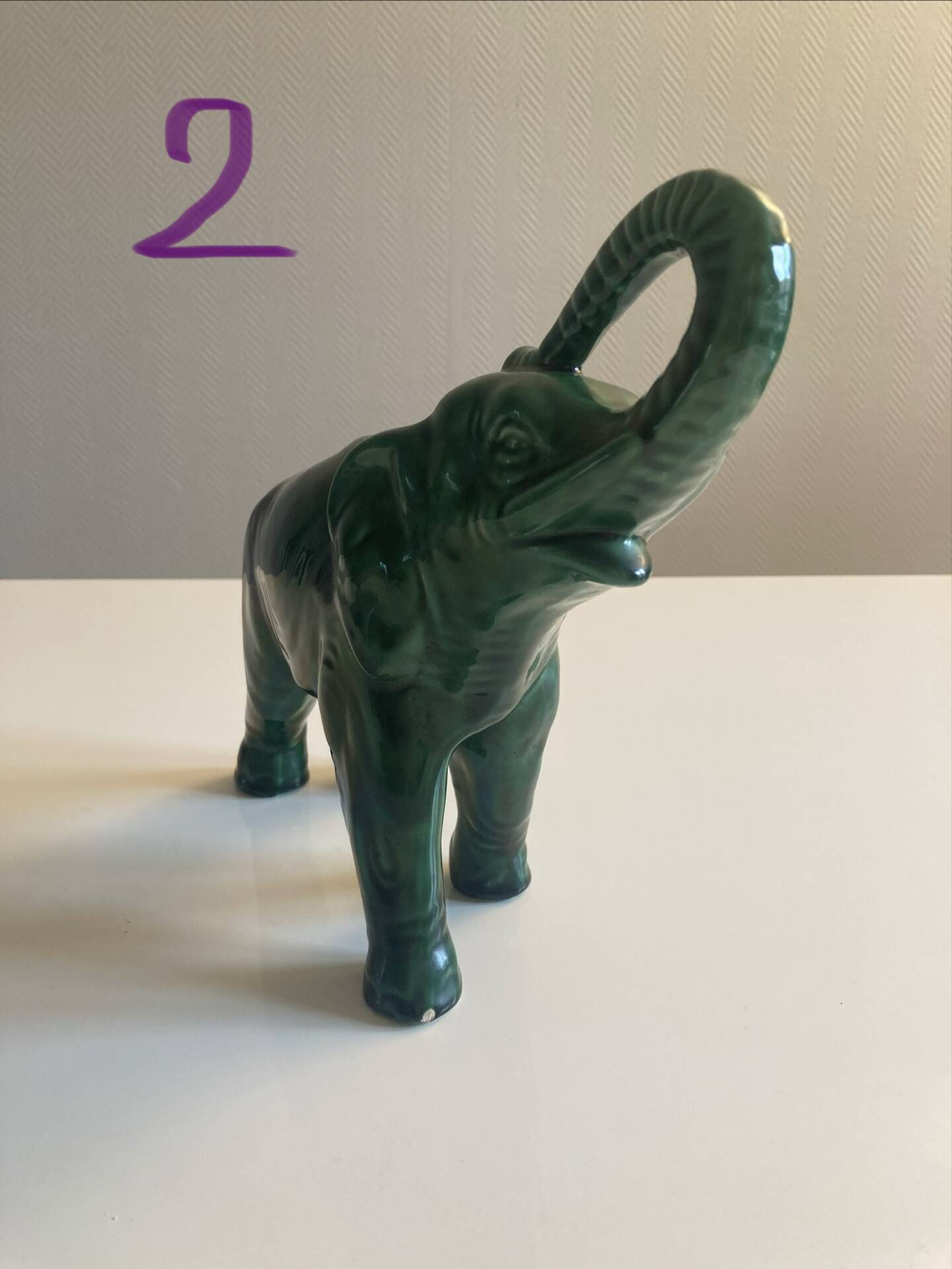 Pair of marbled faience elephants from Saint Clément
