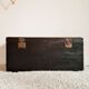 Old black wood trunk