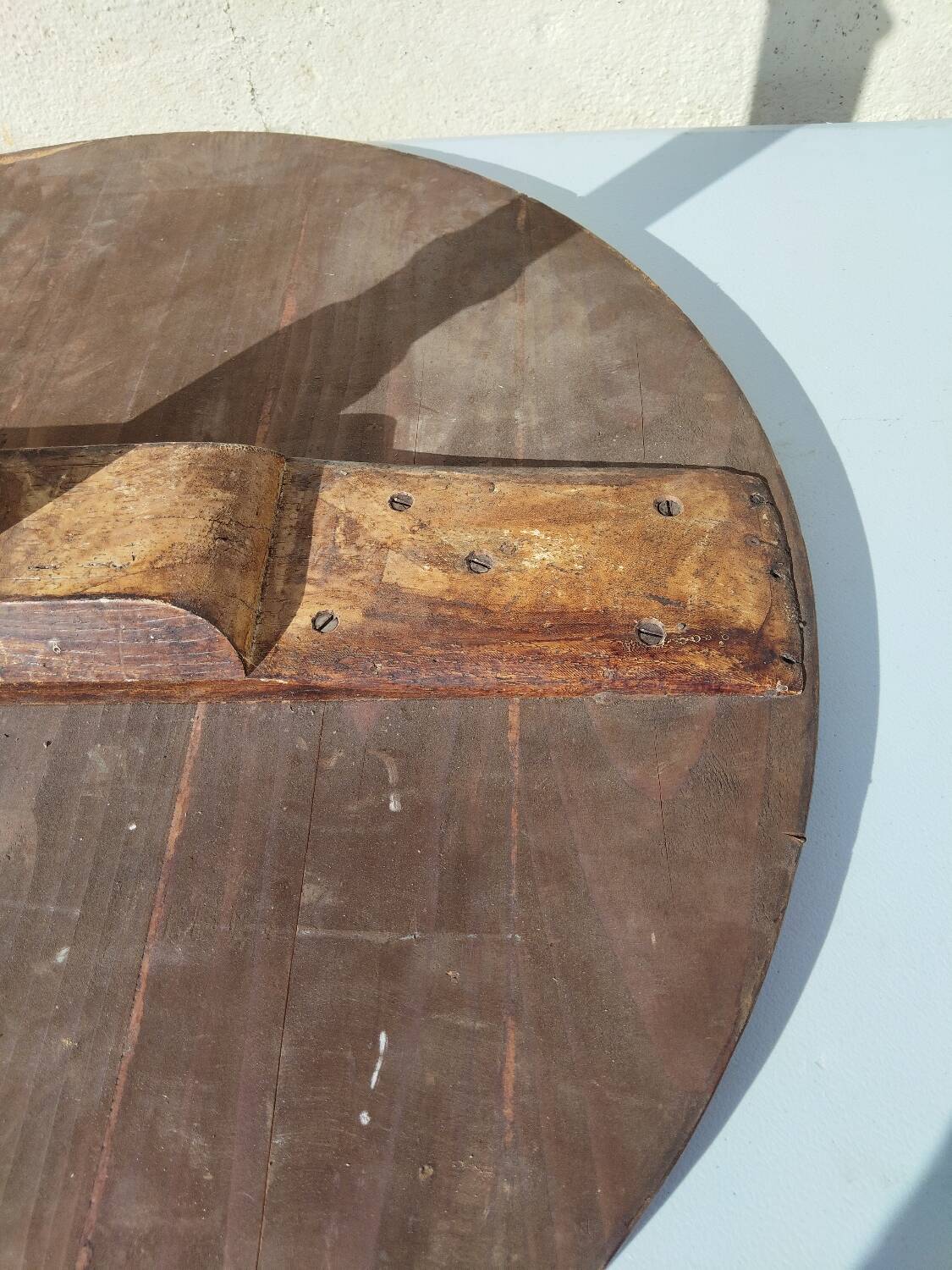 Small rustic antique tripod side table made of solid wood.