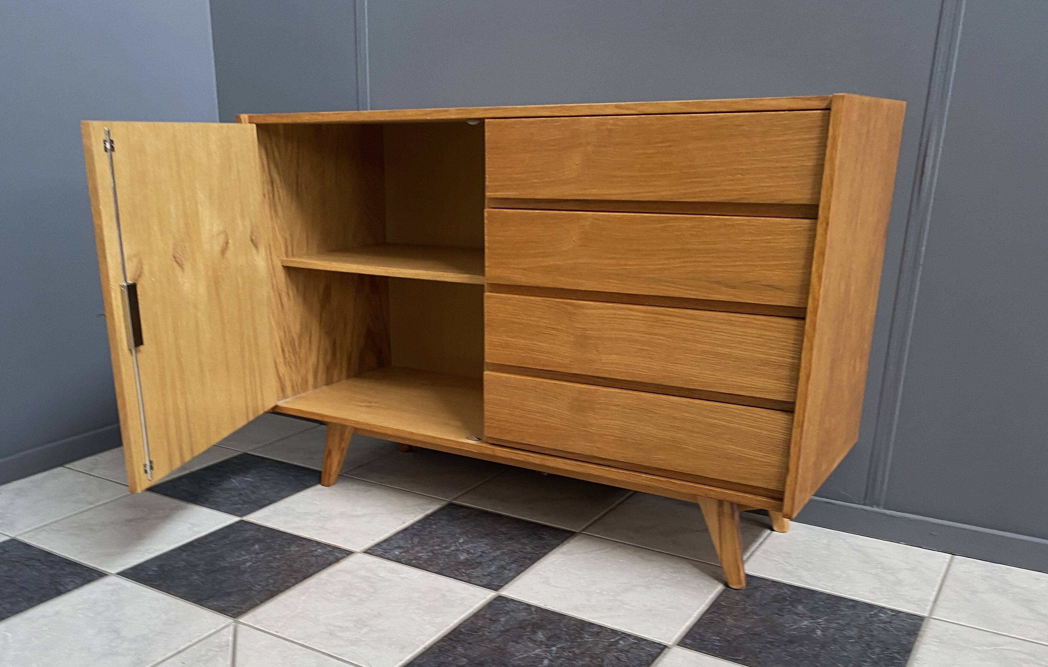 Blonde wood buffet Jiri Jiroutek, model U458 from the 1960s, with 4 drawers and a door.