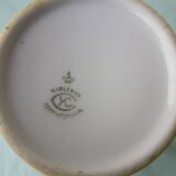 Coffee pot or teapot, sugar bowl and milk jug in porcelain.