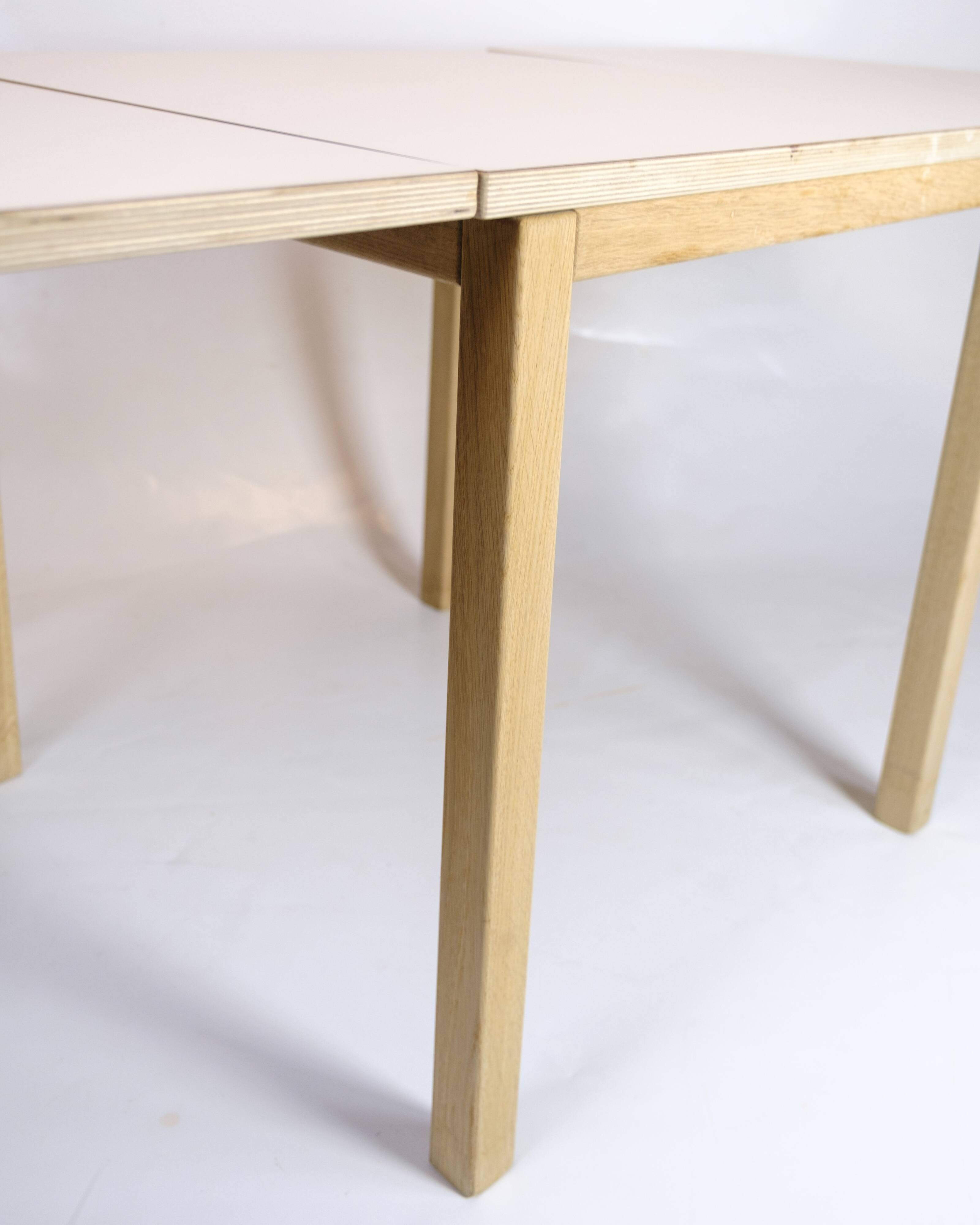 Table with drop leaves - Model 517 - White laminate top - Oak - Haslev Møbelsnedkeri