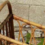 Children's bed in vintage rattan from the 1950s