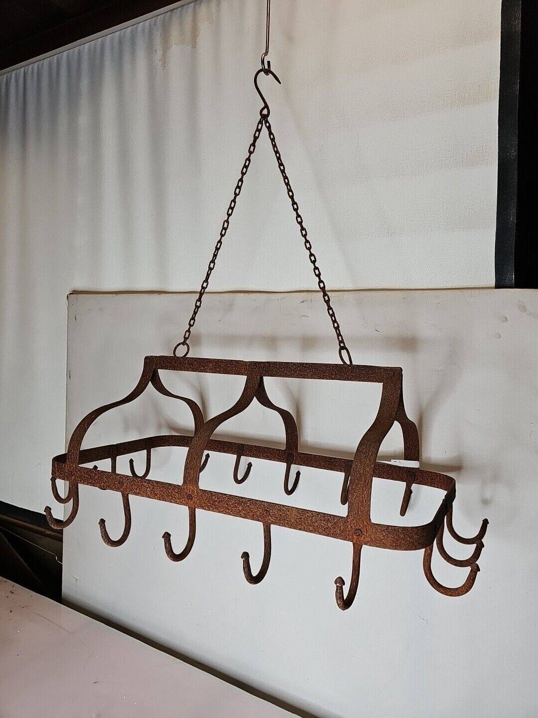 pig holder, wrought iron hook support