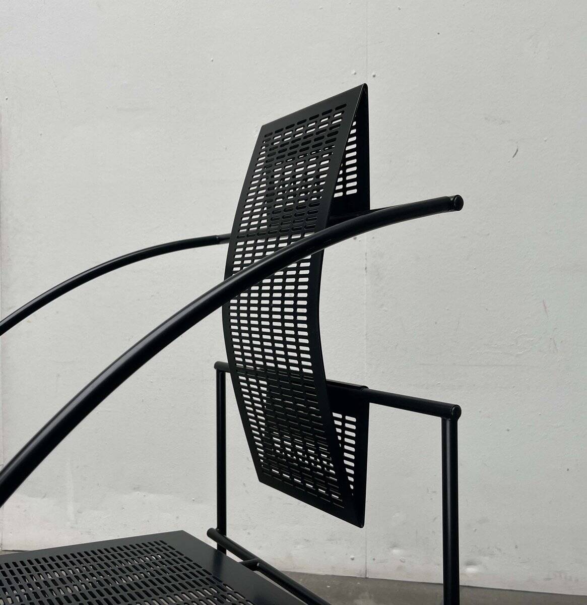 Postmodern black Quinta chair in perforated metal by Mario Botta for Alias, 1980s.