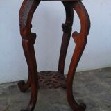 Wooden pedestal table with marble top