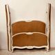 Louis XV style bed in patinated hornbeam, 20th century.