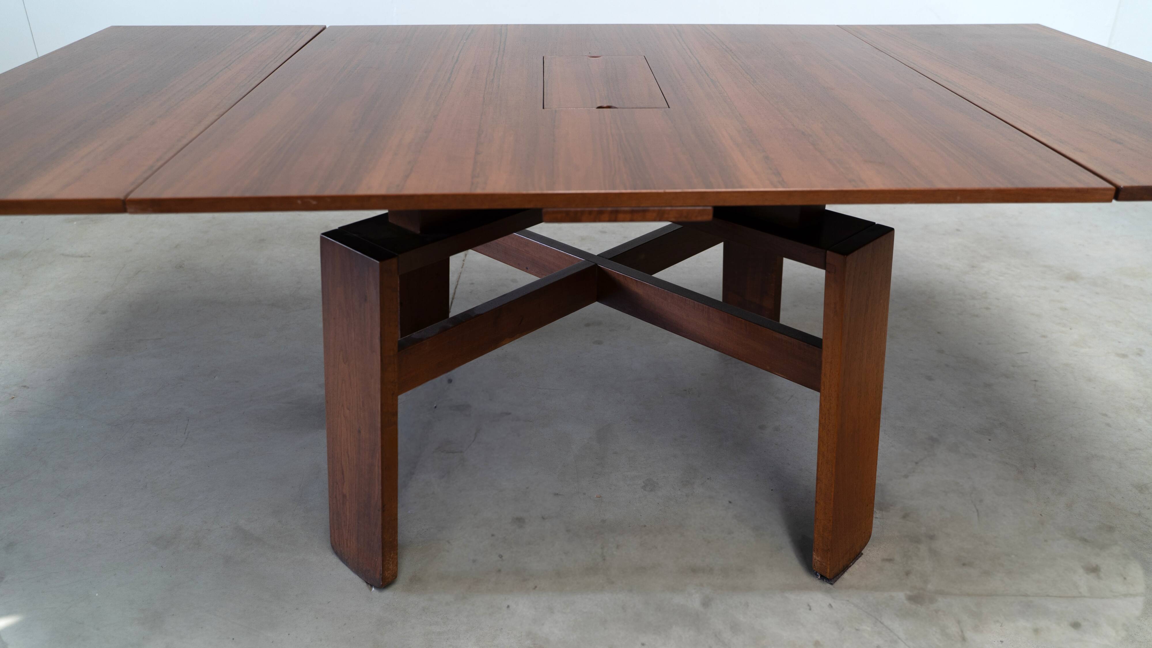 Square extendable dining table by Silvio Coppola for Bernini