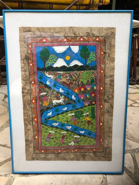 Table framed by a naïve Mexican illustration