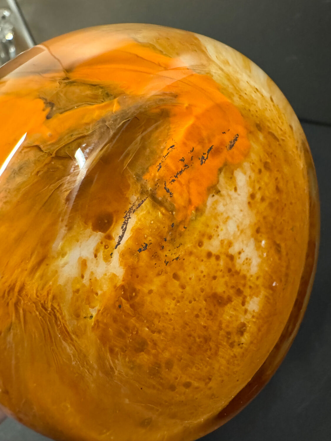 Marbled orange and white glass vase with applied handle – Art Deco