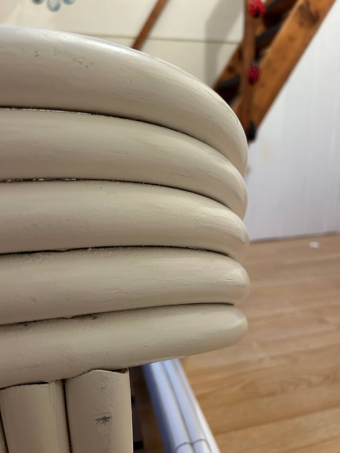 Vintage white rattan bed from the 1960s.