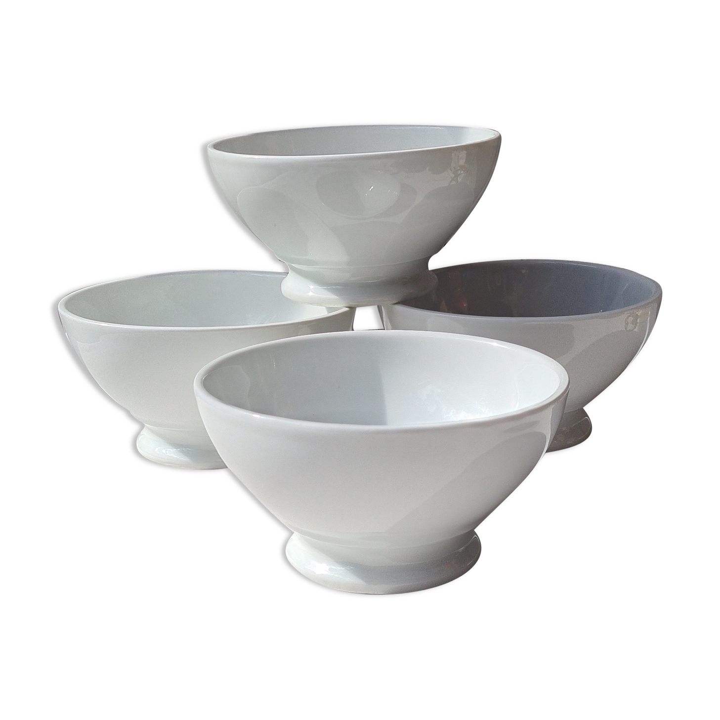 Four bowls made of thick white porcelain