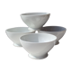 Four bowls made of thick white porcelain