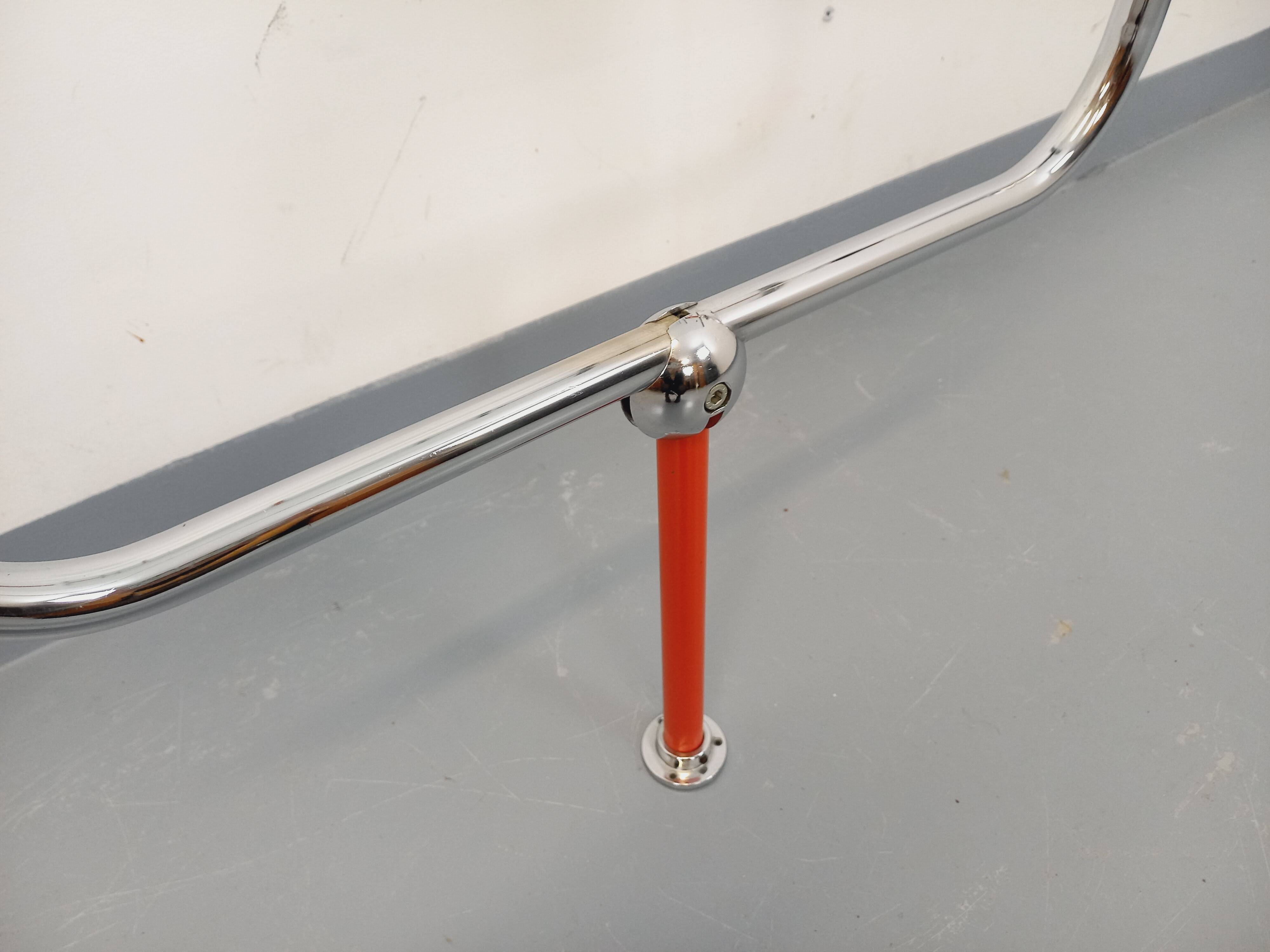 Modular bookshelf in vintage Bauhaus style, red metal, chrome.